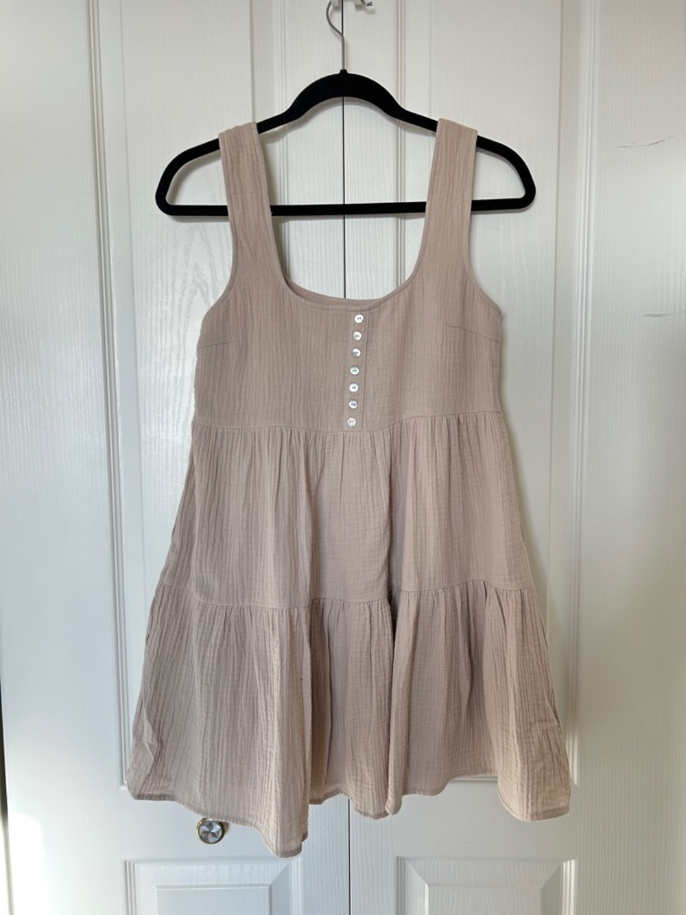 UO Sleeveless Tiered Babydoll Dress in Beige